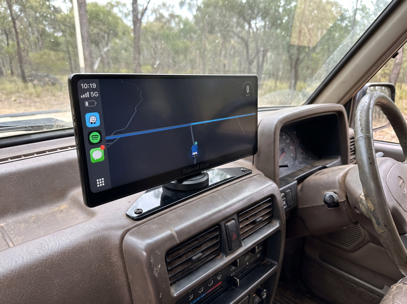 Evara Display mounted in a Nissan Patrol parked at a bush campsite