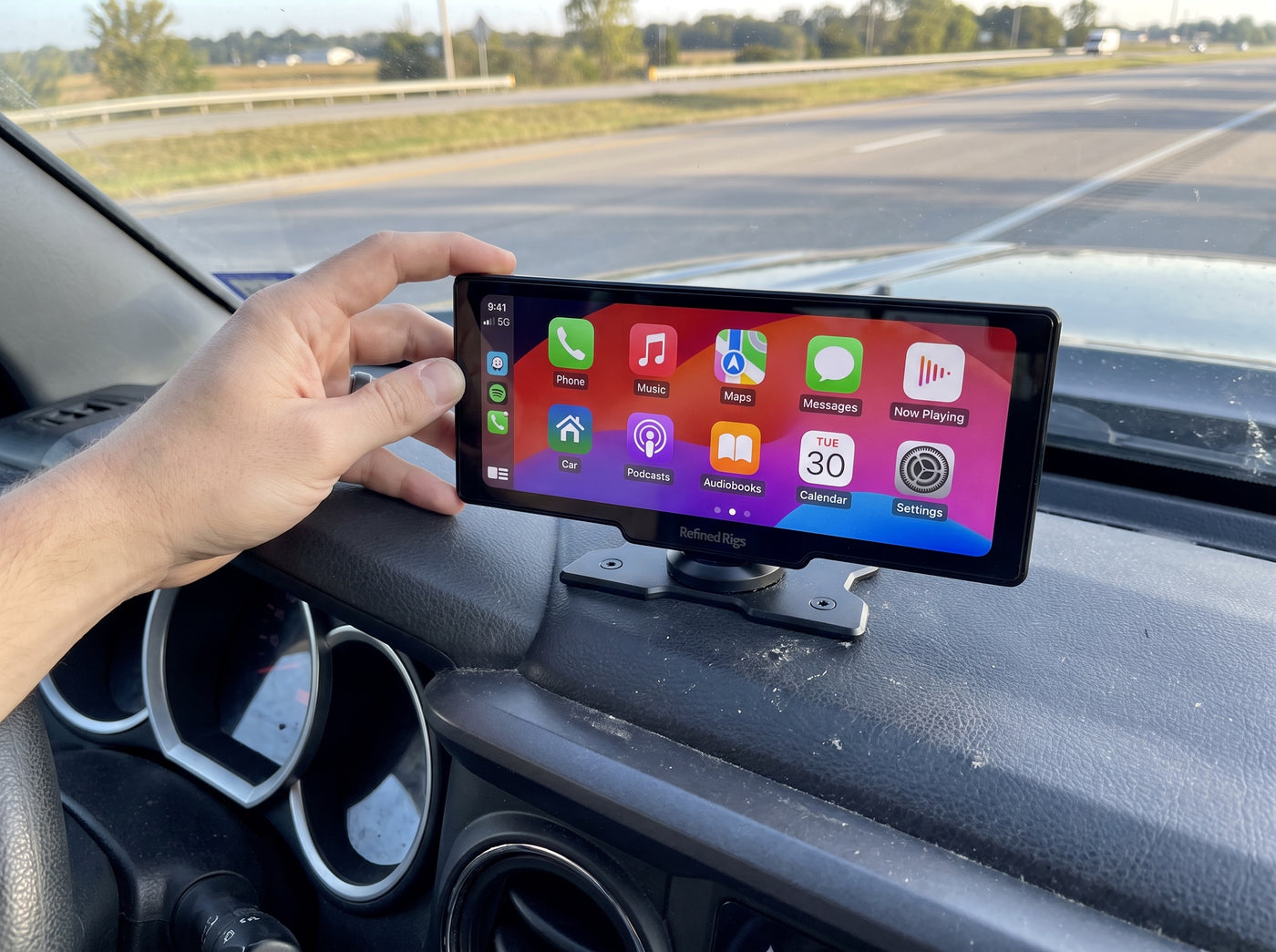 Evara Display showing the CarPlay home screen in a Toyota Tacoma